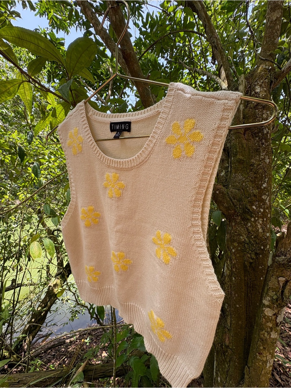 Timing Knit Sweater Vest with Yellow Flower Motif